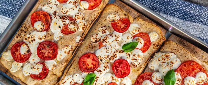 Pizza on a cedar grilling plank